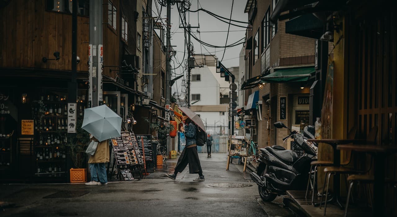 Neon-lit Tokyo street at night — get an LTE.app eSIM for instant data on arrival in Japan