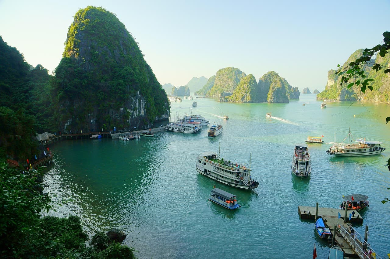Limestone karsts of Halong Bay at sunrise — explore Vietnam with mobile data from an LTE.app eSIM